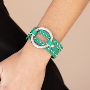 Green leather cuff w/ large silver O-ring & studs